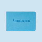 Blue waterproof sketch notebook with 'Huckleberry' branding on a white background